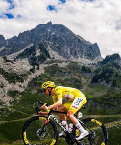 tour de france 2025 magazine cyclist with mountain view